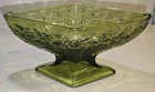 vintage Indiana Glass bowl, often found in olive or avocado green.