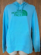 The North Face Women s Aqua Blue Hoodie with Green Logo