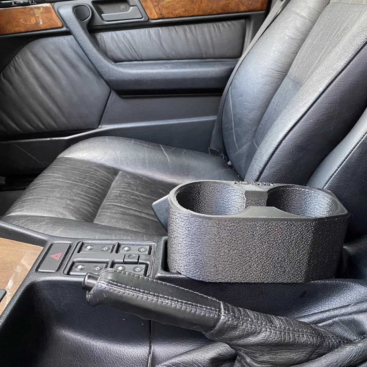 E34 2024 cup holder