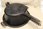 Made by Griswold #76 for W.M.C. Co. N.Y. Cast Iron Waffle Iron on Tall Base