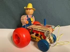 Vintage Fisher Price Farmer Tractor Wood Pull Toy #629 1961 wobbles side to side