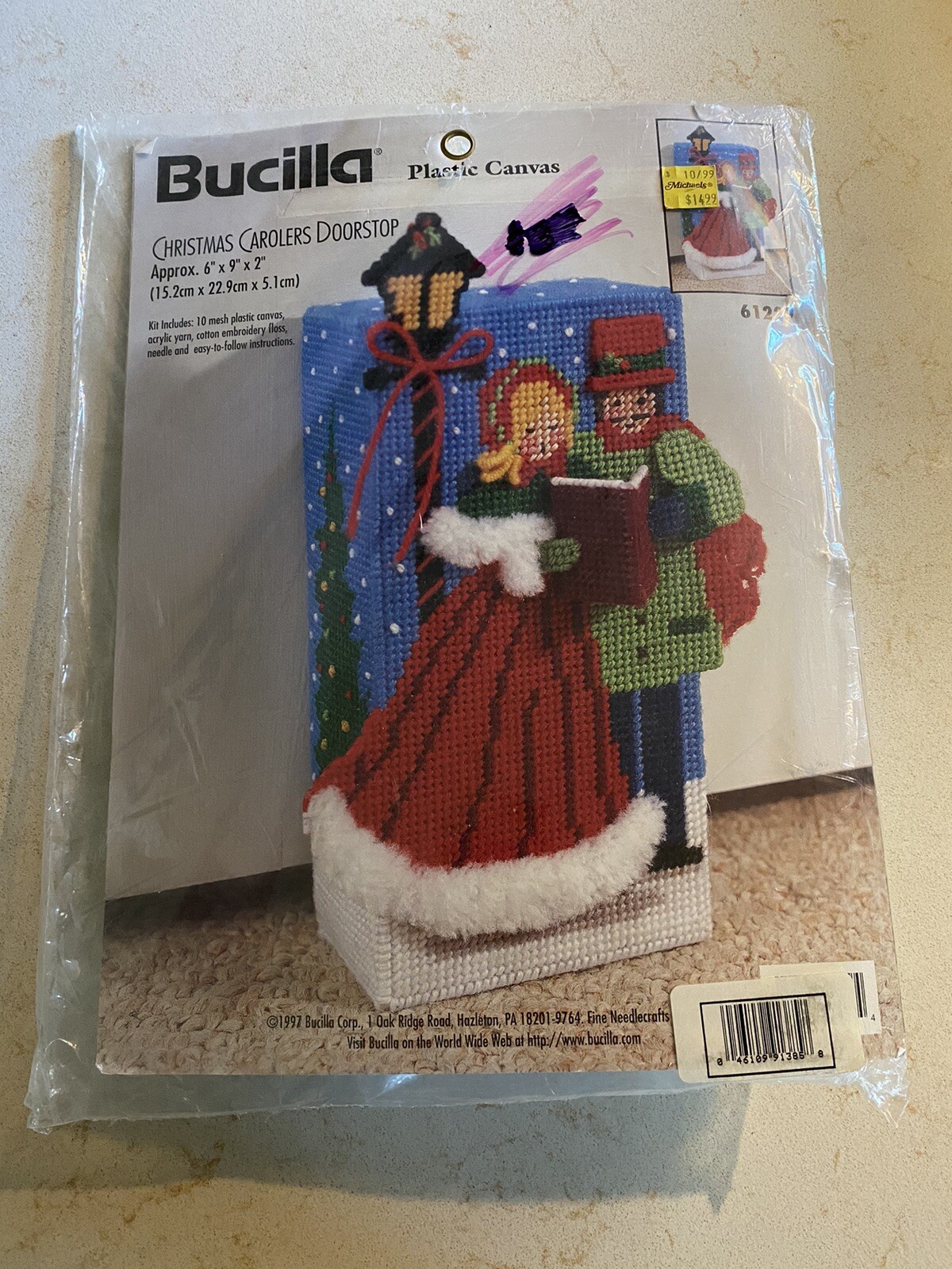 Bucilla 61229 Christmas Carolers Doorstop Plastic Canvas Needlework Kit