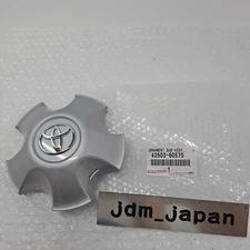 Toyota 42603-60570 ORNAMENT SUB-ASSY, WHEEL HUB(FOR FRONT) Genuine OEM New