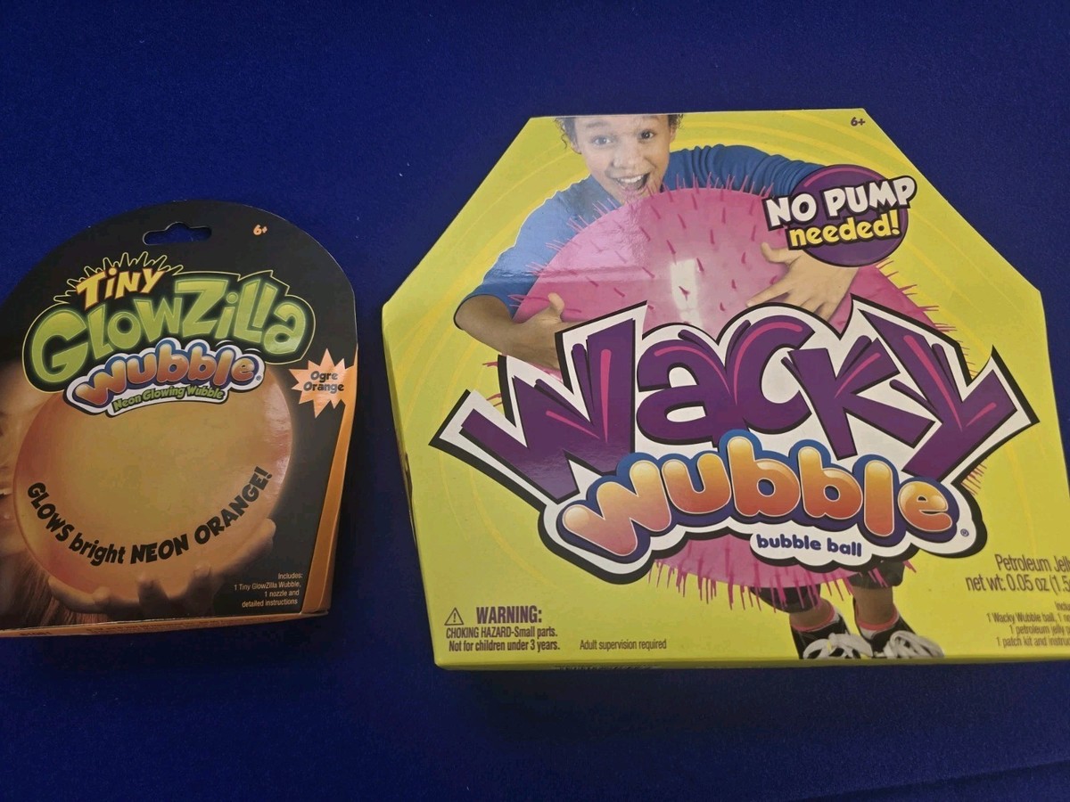 Lot Of 2 Brand New WUBBLES. 1 Tiny Glowzilla Orange 1 Large Wacky