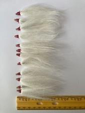 SLIP STYLE, BUCK TAIL TEASERS. MAKE YOUR OWN RIGS  . ADD YOU OWN HOOKS. 12