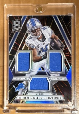 Panini 2024 Spectra Triple Threats Amon-Ra St. Brown #TT-15 Hyper /75 MEM