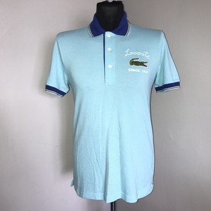 camisa polo color turquesa