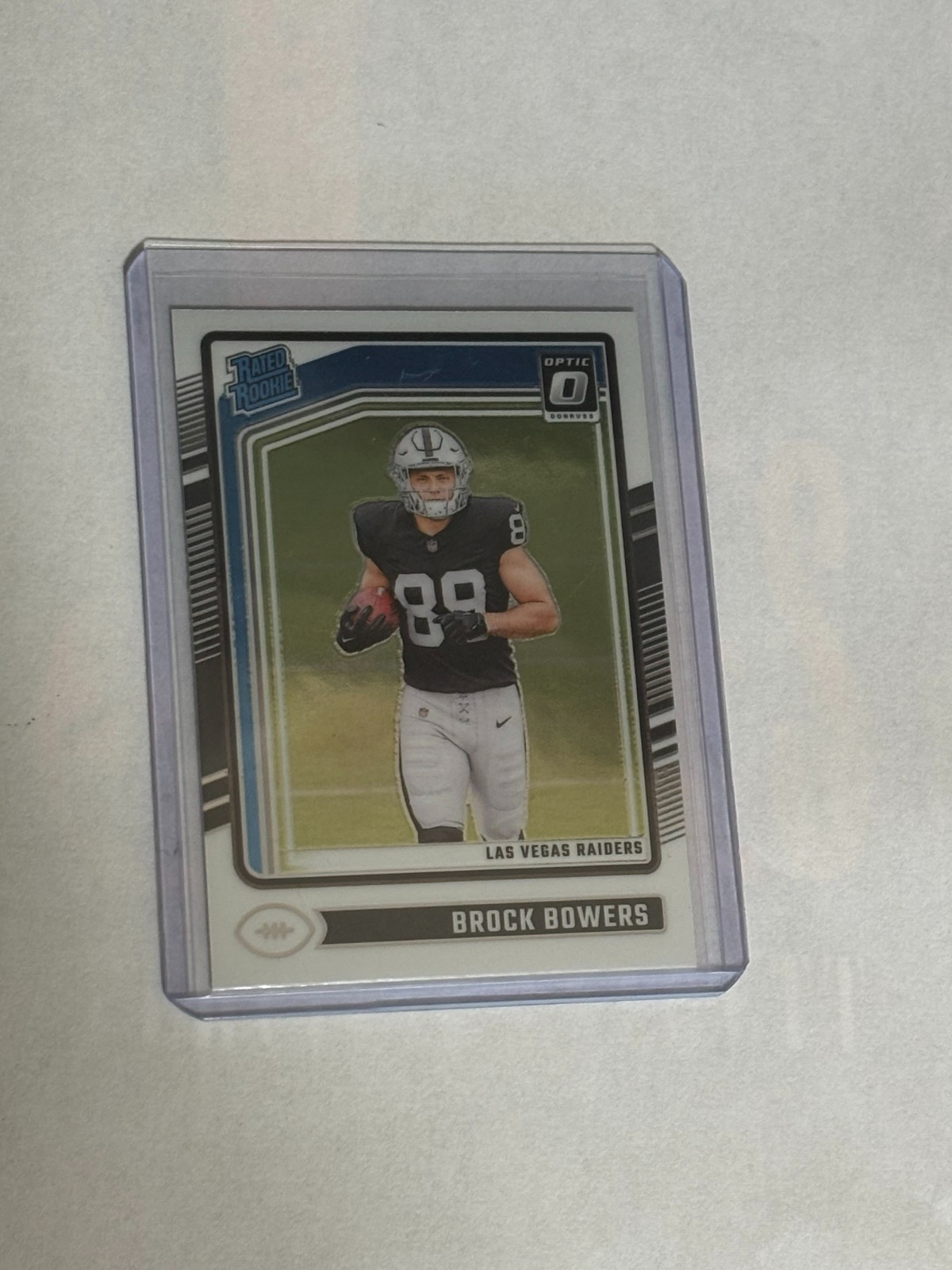 2024 Panini Donruss Optic - Rated Rookie Brock Bowers #215 Holo Prizm (RC)