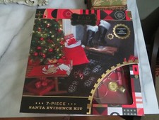FAO Schwarz 7 Pc. Santa Evidence Kit Santas Bag Glasses Bell Glove Button NEW