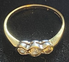 9 Ct Gold Hallmarked 3 Stone Ring. Size L Weight 1.32 Grams. Stamped G&TJ.