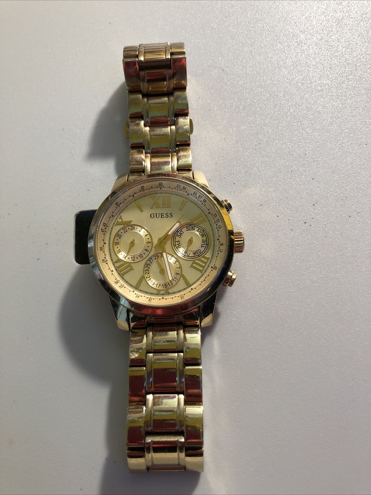 Guess Ladies Sunrise Multi Dial PVD Gold Plated Bracelet Watch W0330L1