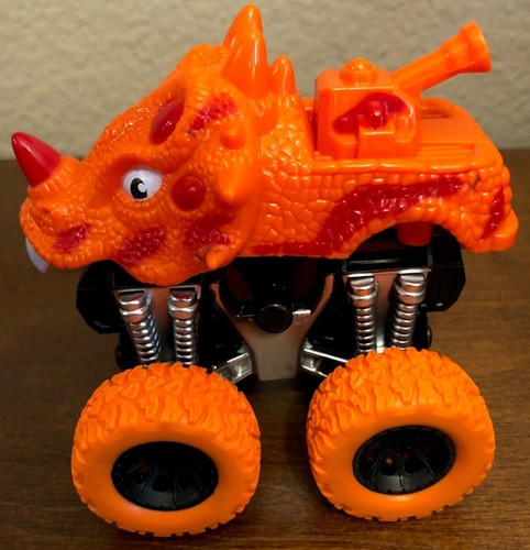 Big Wheel Friction Powered Orange Dinosaur/Triceratops Monster Truck - NEW