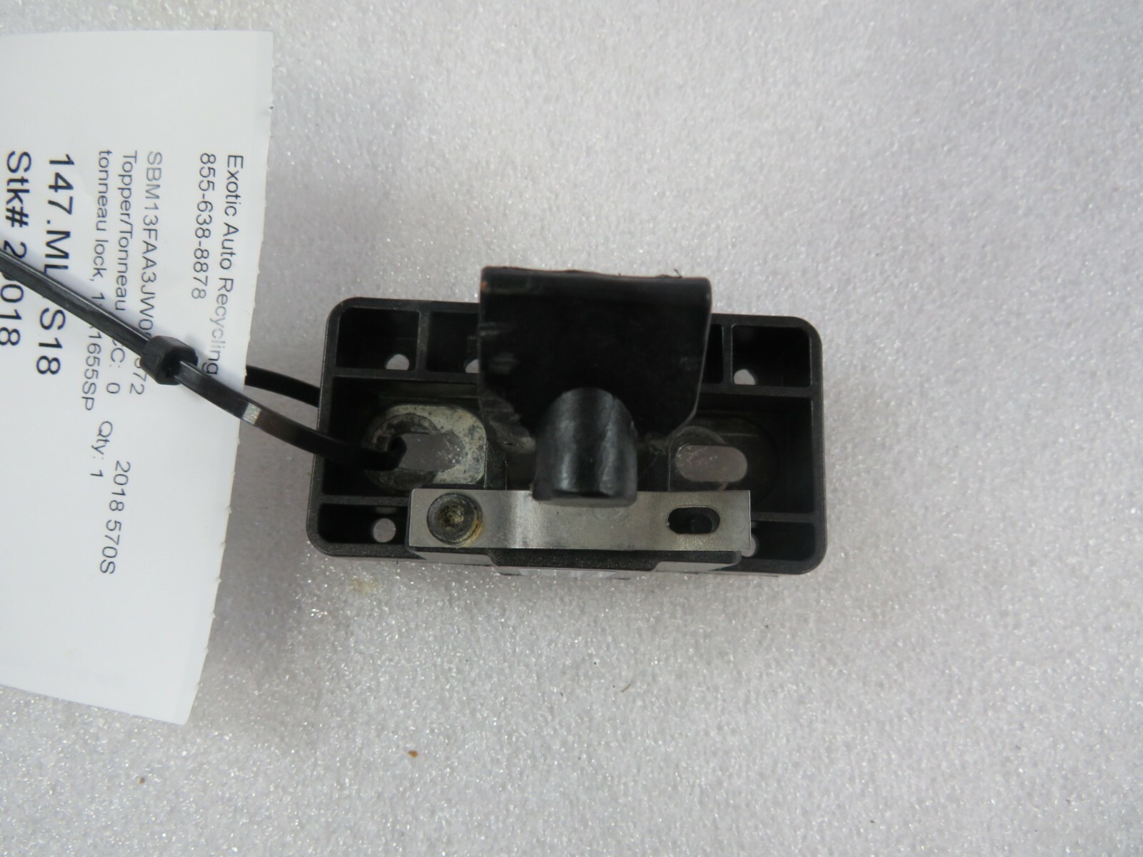 McLaren 570S, Tonneau Lock, Used, P/N 11A1655SP