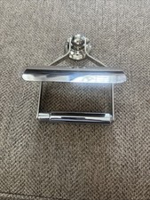 Soporte de papel higiénico níquel pulido 