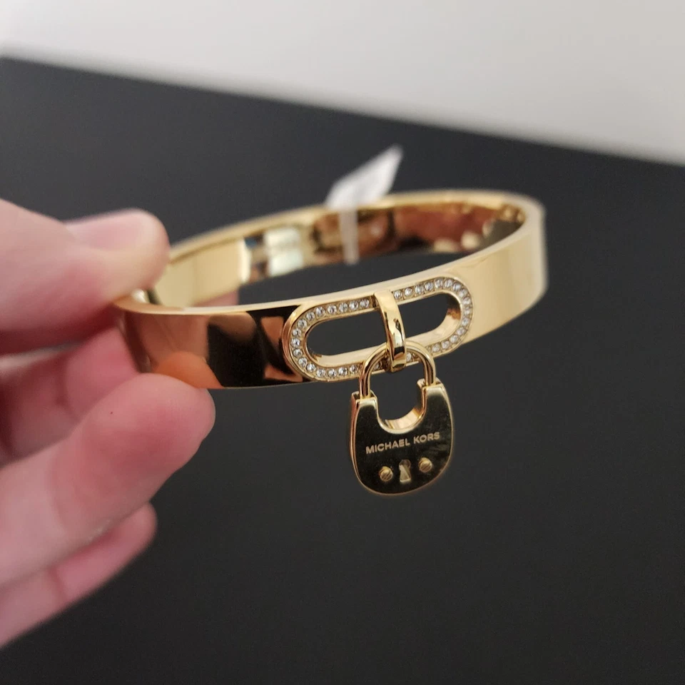 NUEVO CON ETIQUETAS Michael Kors Brazalete Tono Dorado Bloqueo Colgante Estrás 7.5" RARO Foto 2 de 4
