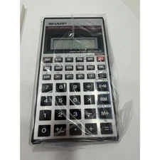 VINTAGE *NEW* 19080's Sharp EL-531A with Textbook Scientific Calculator