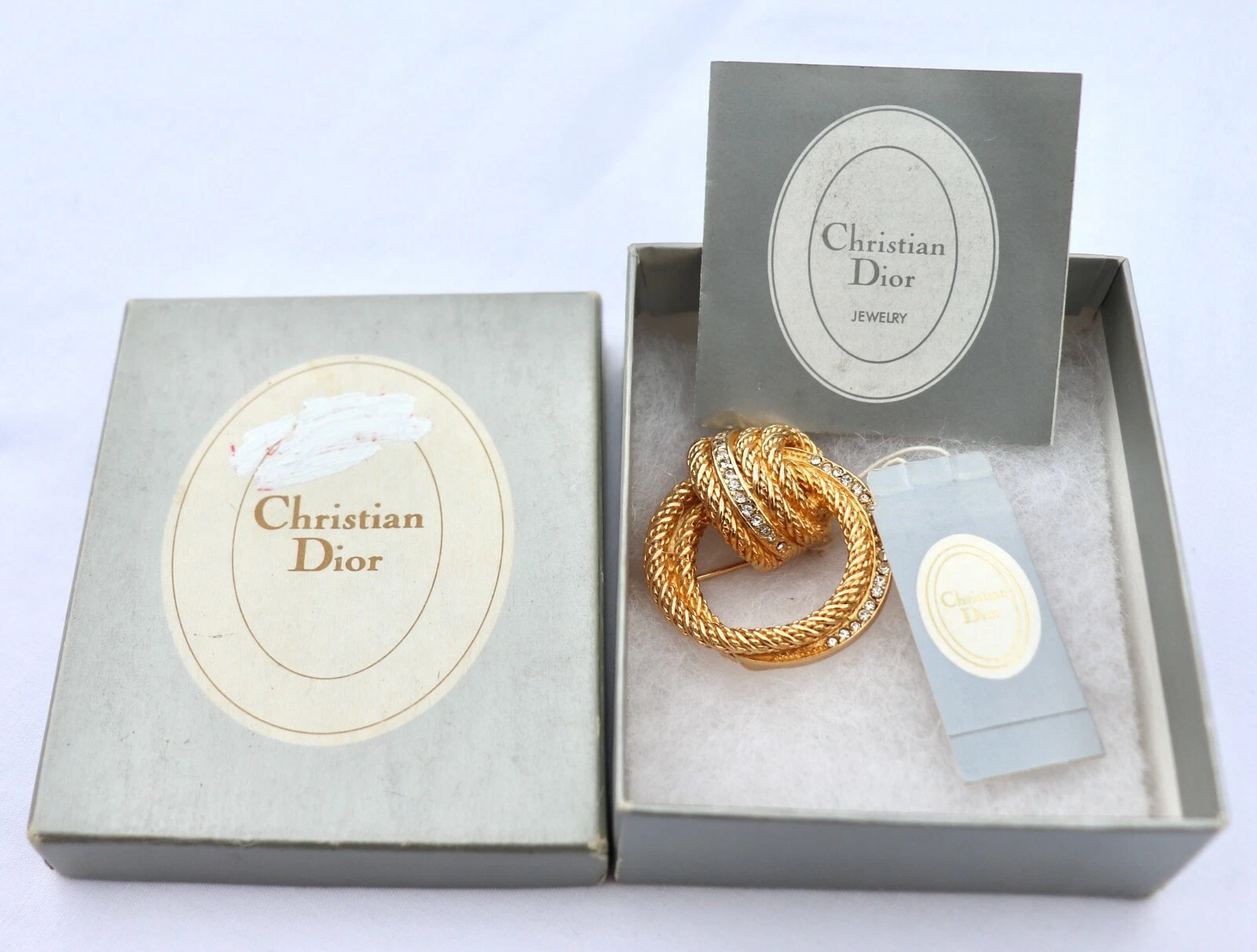 BROCHE CERCLE CORDE PLAQUÉ OR CHRISTIAN DIOR NEUVE DANS SA BOITE AVEC ETIQUETTE ET GARANTIE