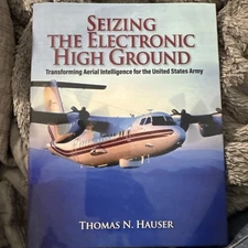 Seizing the Electronic  High Ground - Thomas N. Hauser
