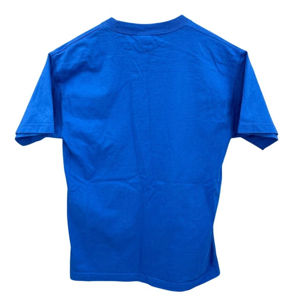 Camisa Kelloggs Hombres M Azul Hacer Algo de Ruido Camiseta Gráfica 2013 Camiseta Ropa de Calle Foto 2 de 4