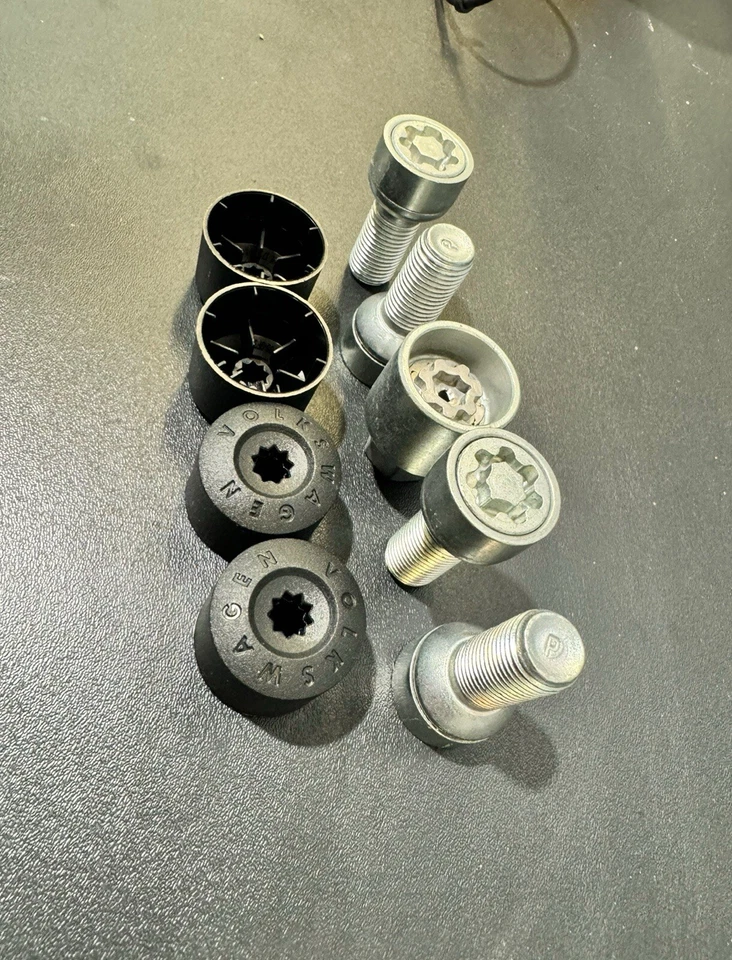Tuerca de bloqueo de rueda Volkswagen 2000-2025 nueva con tapas y llave 100 % OEM. Foto 4 de 4