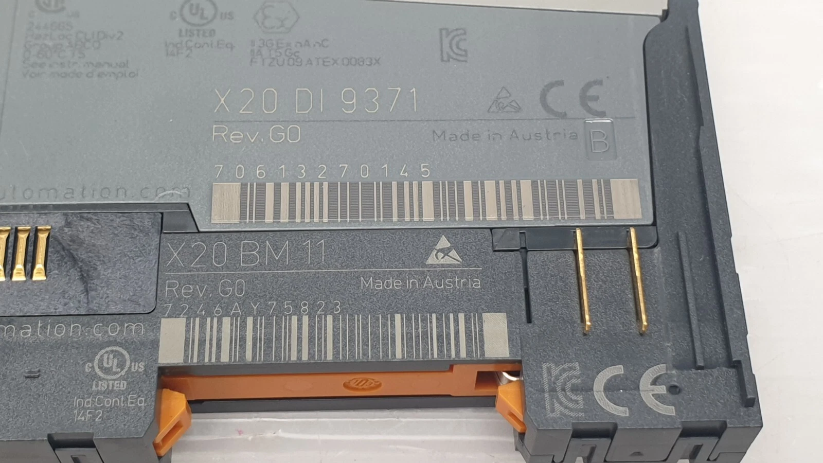 Close-up of labels: X20 DI 9371 Rev. G0 and X20 BM 11 Rev. G0, Made in Austria