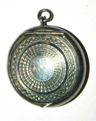 petit pendentif poudrier vintage en métal argenté - Photo 1/3