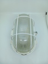White Oval Outdoor Bulkhead Light Vandal Resistant Caged Wall Light