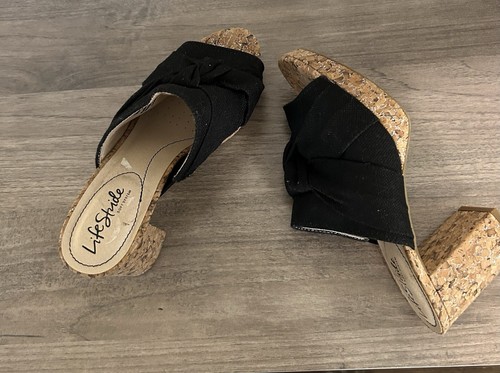 Step Out In Style With Life Striders Chic Black Cork Wedge Sandals.