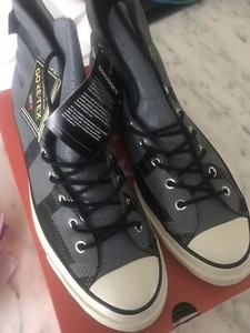 grey leather high top converse