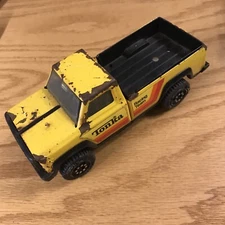 Tonka Pressed Steel Racing Team Yellow Pickup Truck - 7" Long