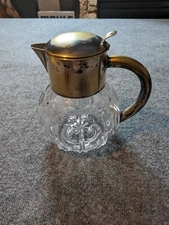HKE antique , Germany heavy Cut-Chrystal Pitcher. Silver-plated top and handle.