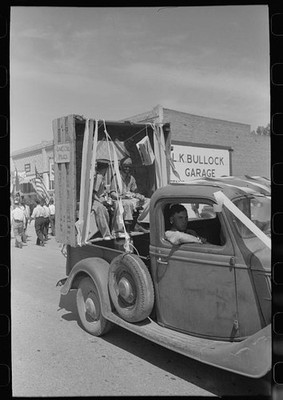 Photo:Vale Oregon Fourth of July Parade 1941 Truck Float Garage Sign