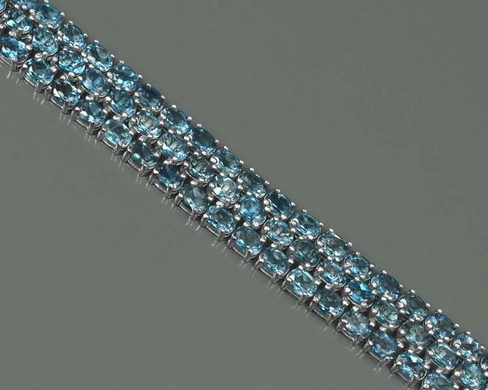 Pulsera tenis de plata de ley 925 con piedras preciosas ovaladas de topacio azul de Londres regalo para ella Foto 2 de 4