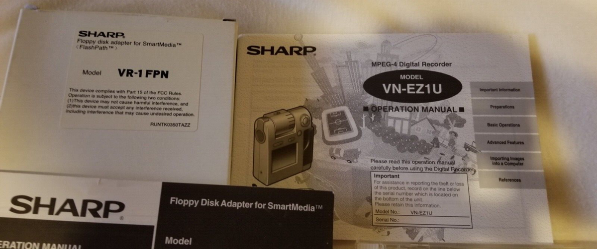 Sharp VN-EZ1 MPEG-4 Digital Video/Photo Camera. Working Complete