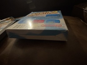 Carro Super Mario Bros 2 NES casi nuevo, caja sello ovalado caja Rev-A y manual (Dmg)