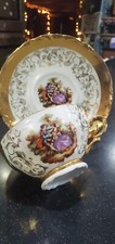 Vintage GOLD TRIMMED TEACUP AND SAUCER