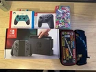 Nintendo Switch (Boxed) With Games, Additional Controllers, Travel Case Etc.