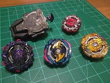 4 Beyblades & 1 Launcher  Lot