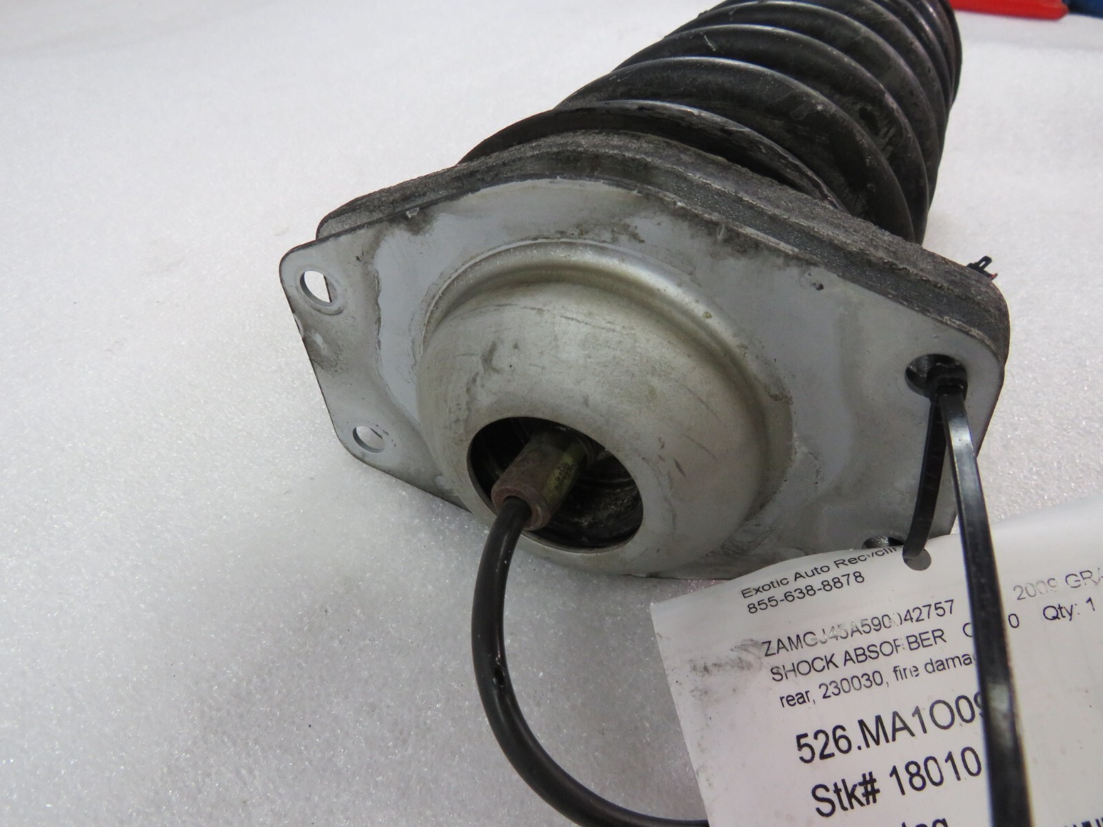 Maserati Granturismo, Rear Shock Absorber, Fire Dmg, Used, P/N 230030