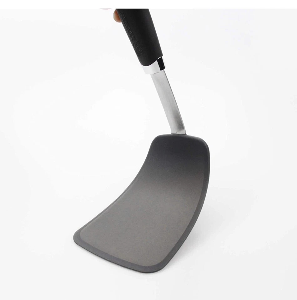 Espátula higiénica de silicona flexible resistente al calor, giratoria negra antiadherente Foto 2 de 4