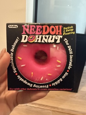 Authentic NeeDoh Donut, pink frosting with yellow sprinkles