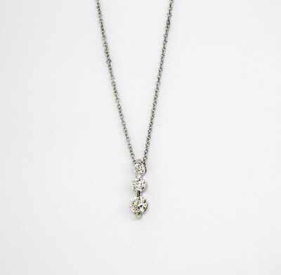 Halskette Kreisel aus 18k Weißgold mit Diamanten Lichtpunkt Trilogie - 0,70 ct.