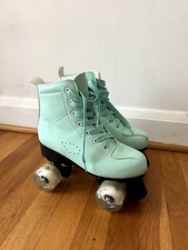 Size 8 XUDREZ Light Blue Roller Skates with glow-in-the-dark wheels, used twice