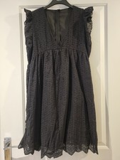 Black Eyelet Dress With Ruffled Sleeves And Built In Shorts In Size L