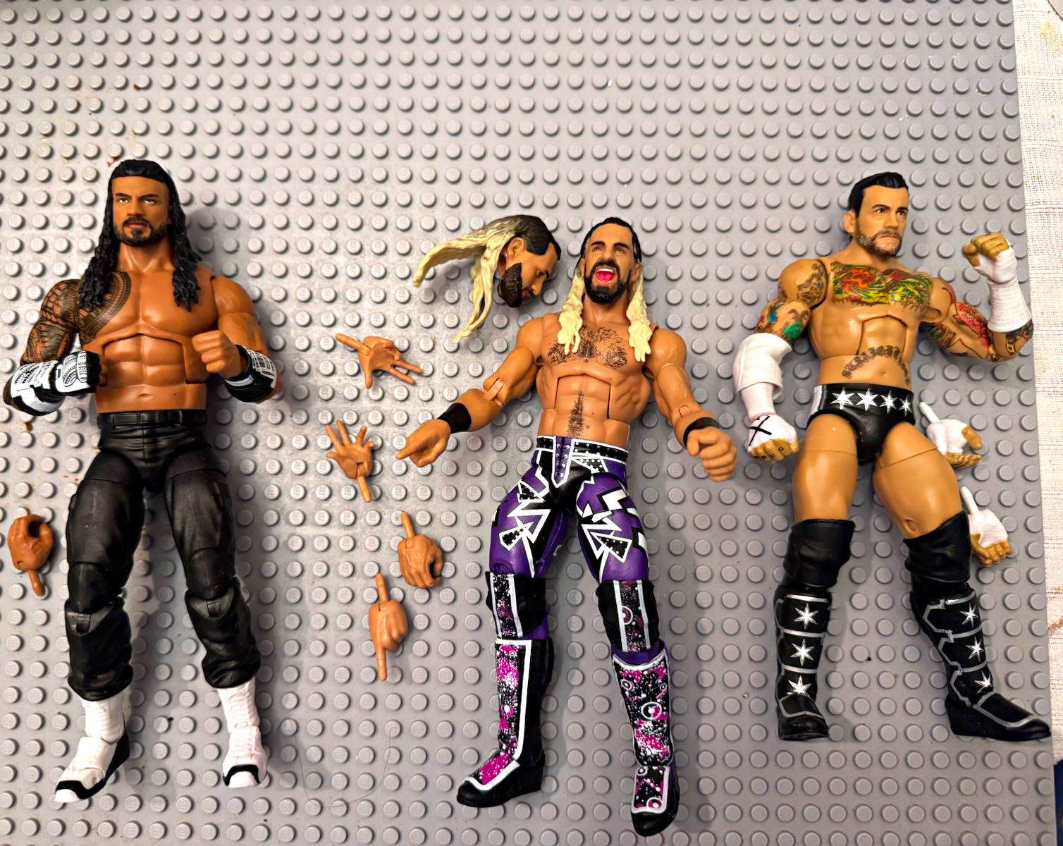 Mattel WWE Mixed Lot 3 Action Figures Roman Reigns Seth Rollins CM Punk