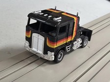 TYCO US-1 ELECTRIC TRUCKING BLACK KENWORTH CABOVER ON A RECONDITIONED CHASSIS