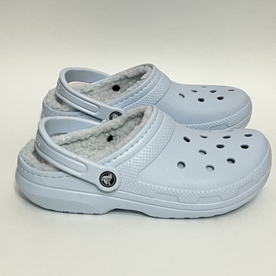 light blue furry crocs