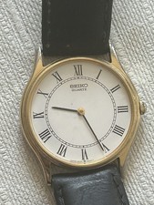 Seiko Quartz Watch - Elegant Gold Tone with White Dial and Leather Strap Working