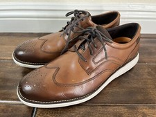 Rockport Men's Garett Wingtip Oxford Lace up Leather Shoe in brown US SIZE 9.5M