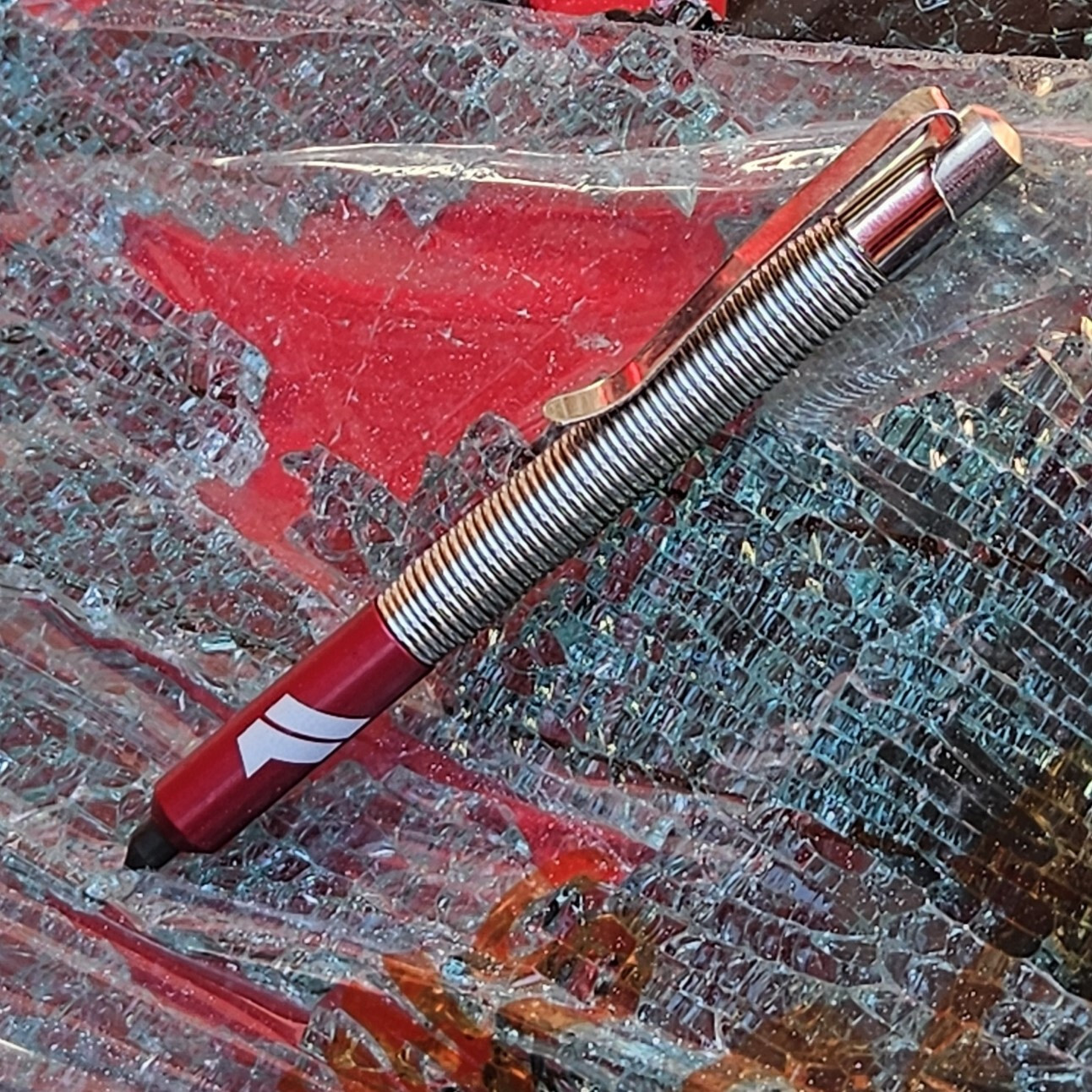 Spring-Loaded Window Punch